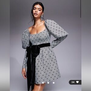 ASOS LUXE flocked bow puff sleeve mini dress with velvet bow in black and white